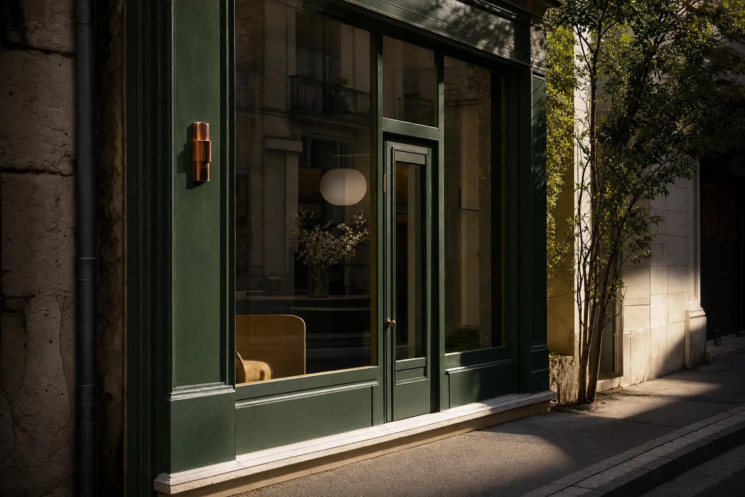 A quiet neighborhood storefront in deep green light